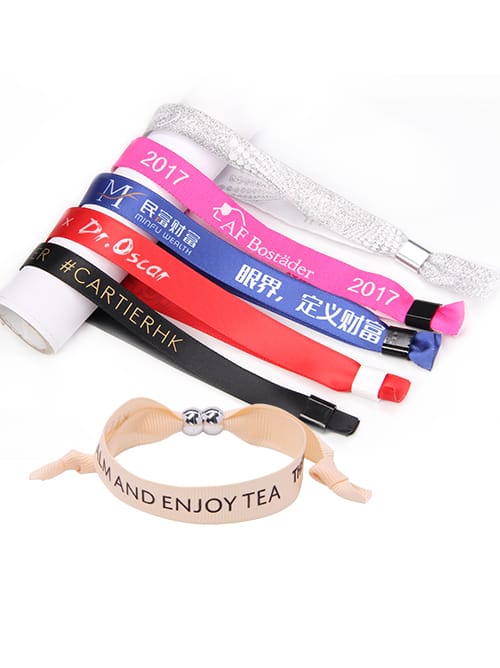Premium woven fabric wristbands with high-security barrel locks for VIP event access.
